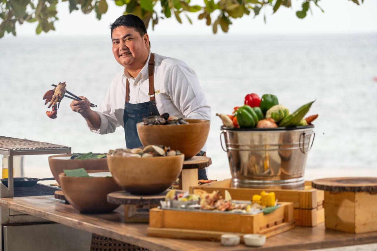 Oceanica Resort Panglao, Bohol Exterior foto Chef preparing food at the hotel